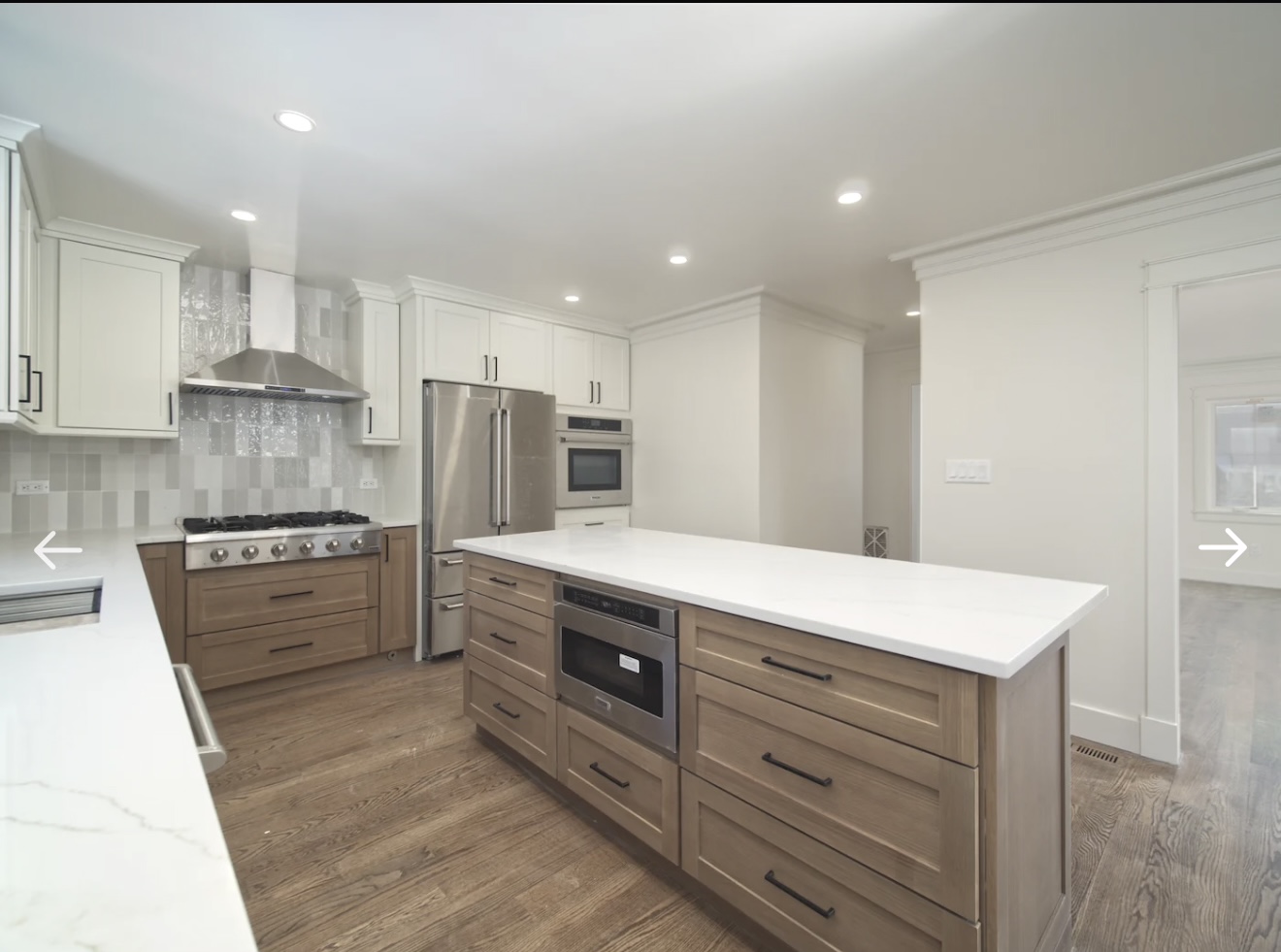 Kitchen island with microwave drawer